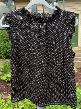 J Crew black sleeveless top, gray and white polka dots with silver accent.